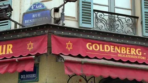 Defendant in four decades old assault on Israeli dining spot in the French capital apprehended in occupied territories